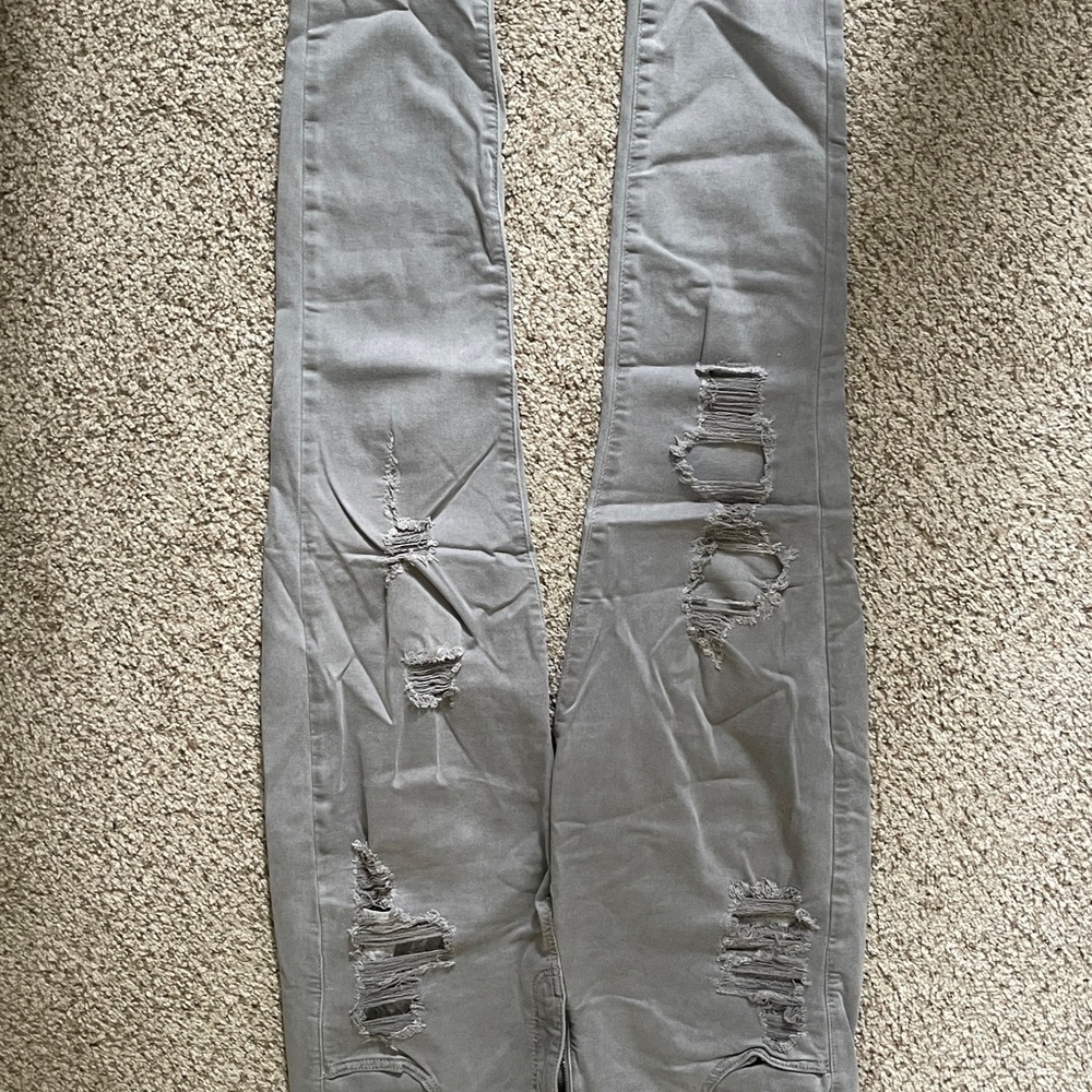 16 American eagle grey distressed jeggings